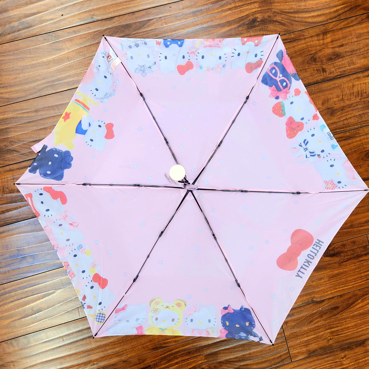 Hello Kitty 50th Anniversay OVER THE YEARS Foldable Umbrella